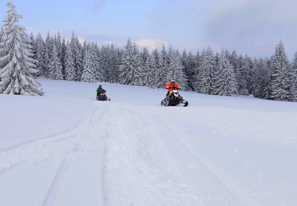 SNOW MOBILE ADVENTURE NEAR TATRA MOUNTAIN IN SLOVAKIA DUPLIK
